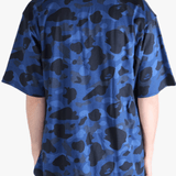 Blue t-shirt worn by a person, showing the shirt's fit