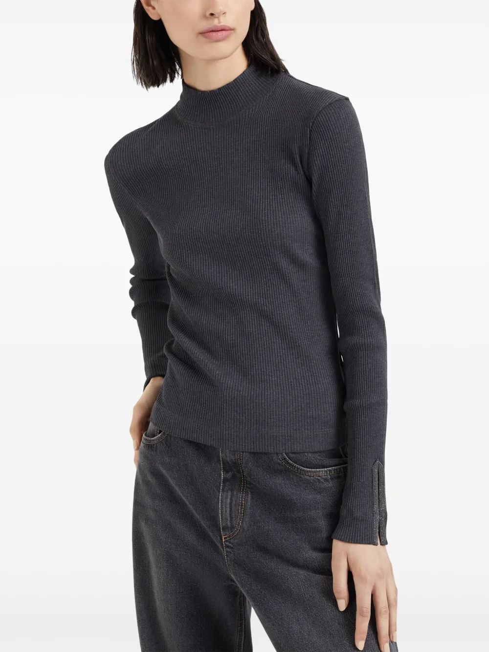 Grey tops worn by a person, showing the tops fit