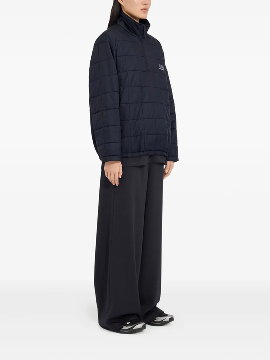 Blue jackets worn by a person, showing the jackets fit