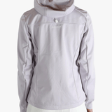 Purple jacket worn by a person, showing the jacket's fit