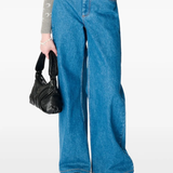 Close up of blue jeans, showing texture of the cotton fabric