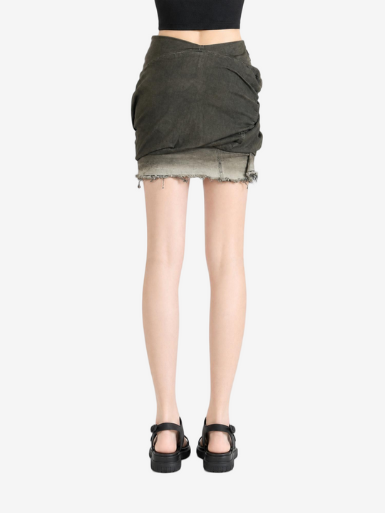 Green skirt worn by a person, showing the skirt fit