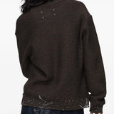 Brown tops worn by a person, showing the tops fit