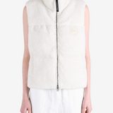 White top worn by a person, showing the top fit