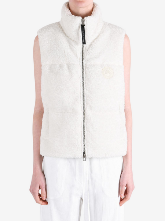 White top worn by a person, showing the top fit