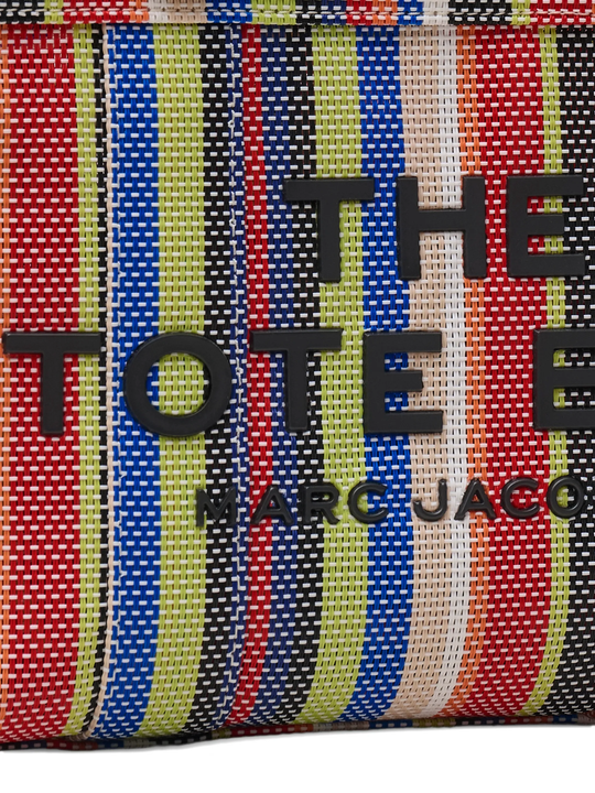 Close up of red bag, showing texture of the cotton fabric