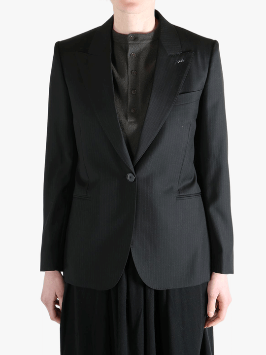 Black jacket worn by a person, showing the jacket's fit