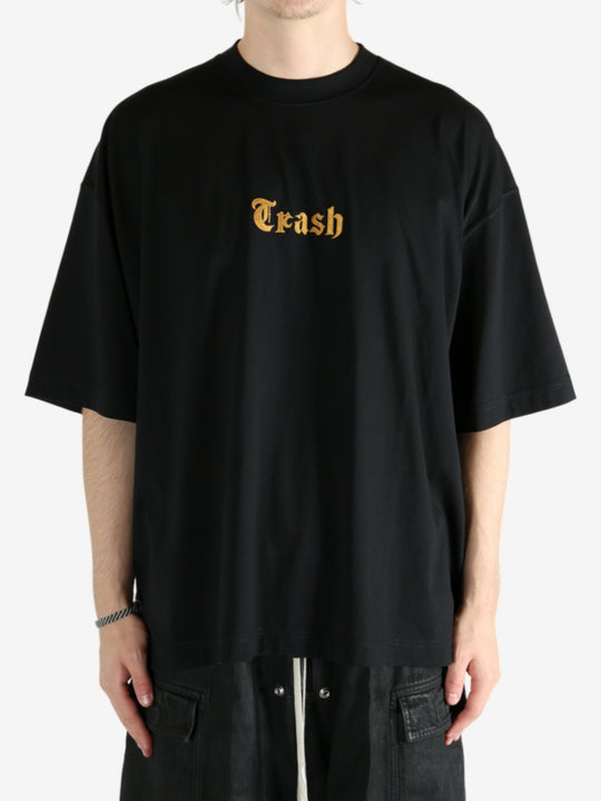 Black t-shirt worn by a person, showing the shirt's fit