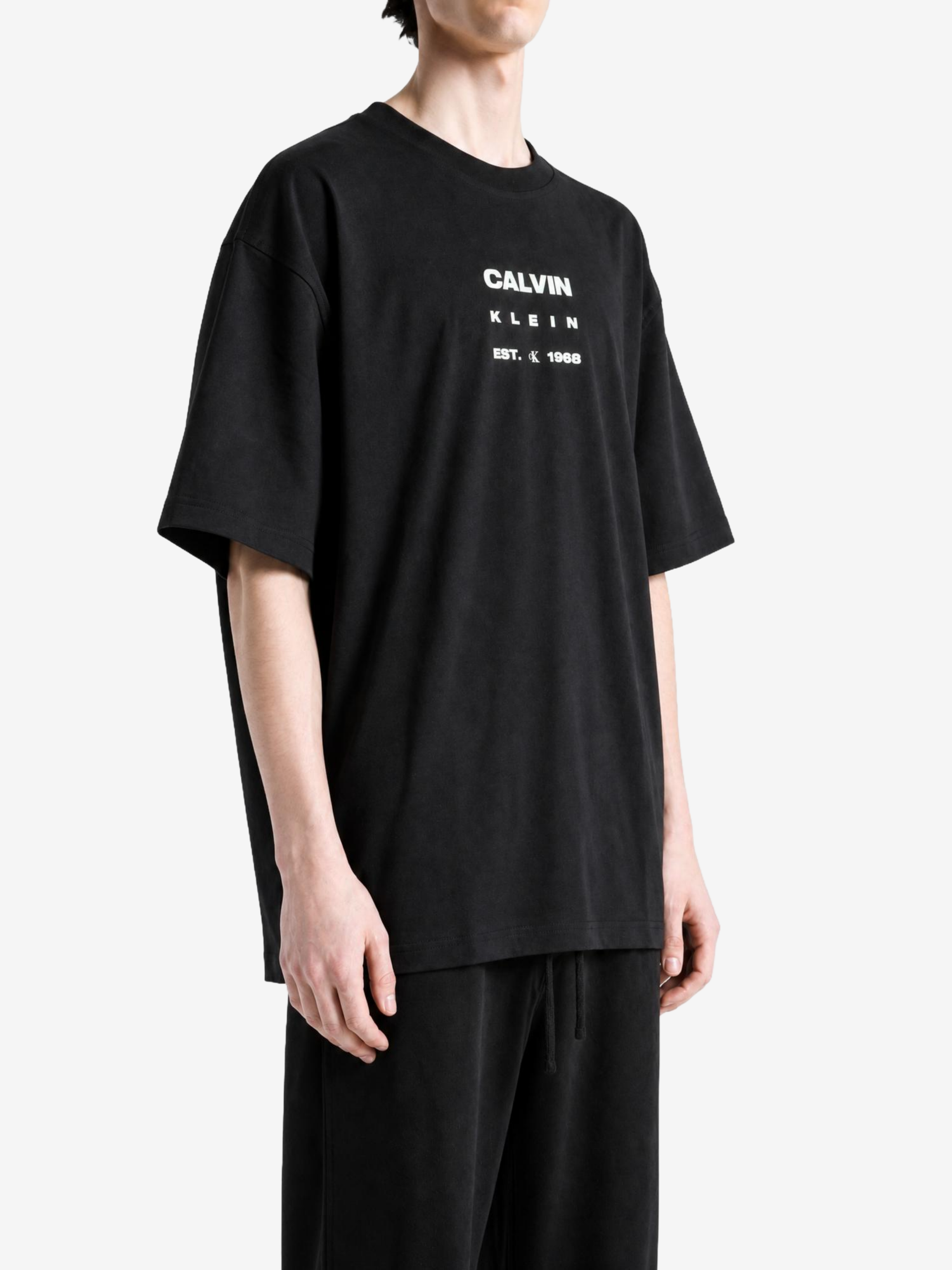 Black t-shirt, full body view
