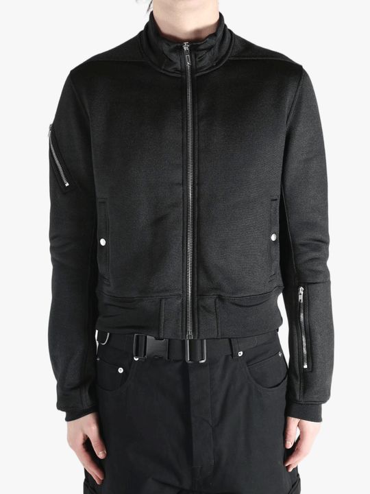 Black jackets worn by a person, showing the jackets fit