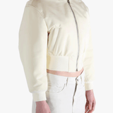 White jackets worn by a person, showing the jackets fit