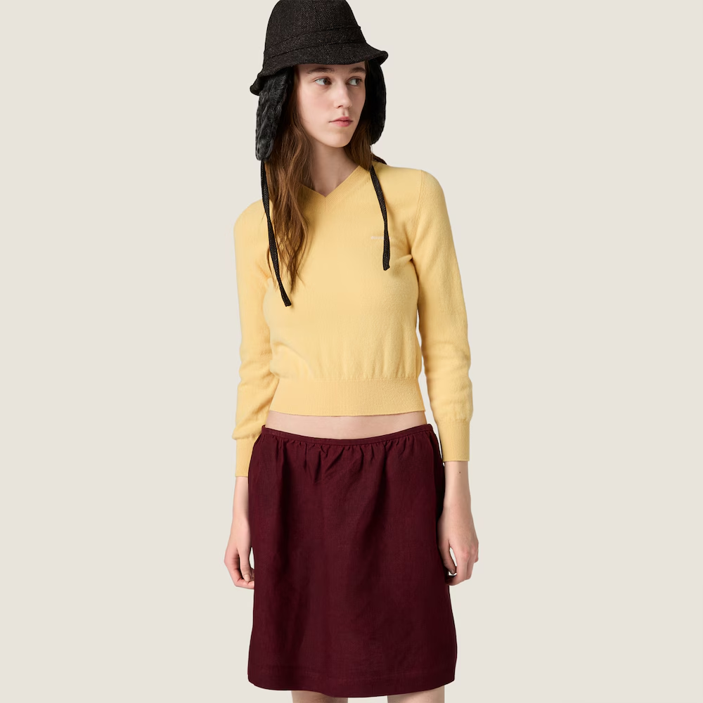 Yellow knitwear, full body view