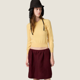 Yellow knitwear, full body view