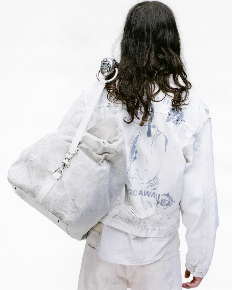 White jacket worn by a person, showing the jacket's fit