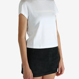 White t-shirt worn by a person, showing the shirt's fit