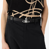 Black accessories worn by a person, showing the accessories fit