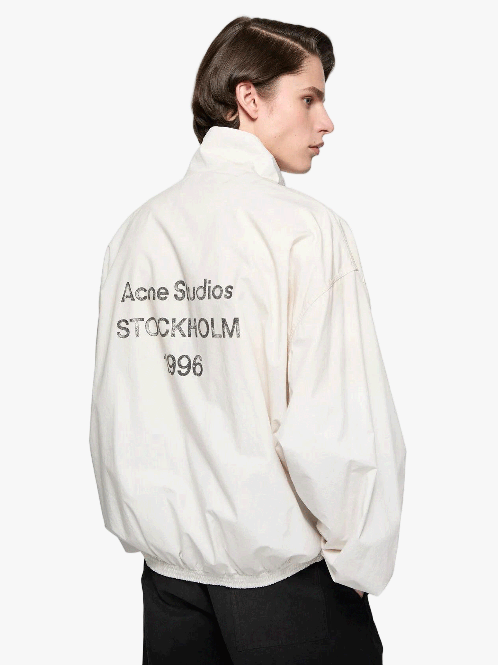 Tan jacket worn by a person, showing the jacket fit