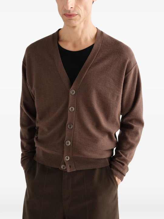 Brown knitwear worn by a person, showing the knitwear fit