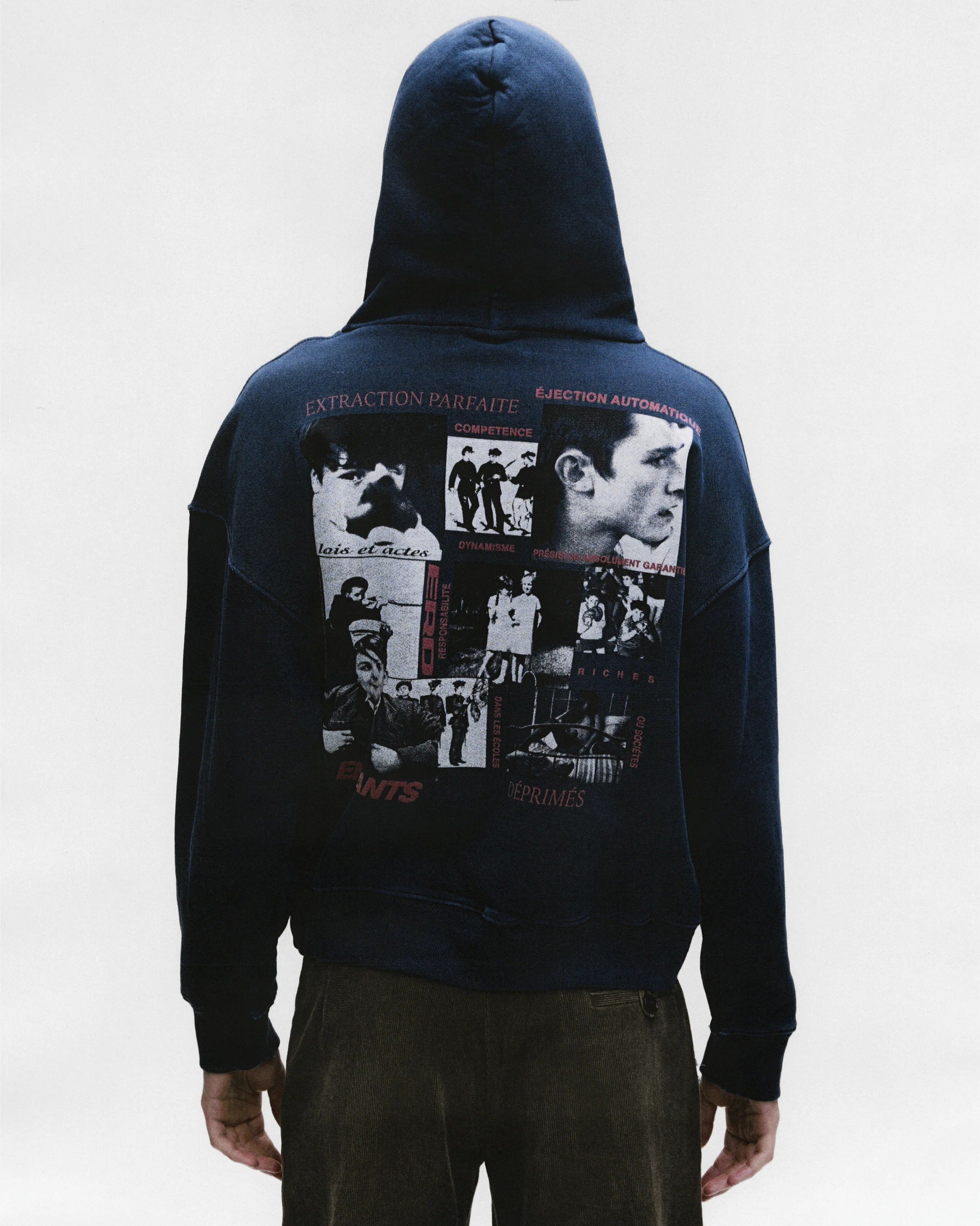 Green hoodie worn by a person, showing the hoodie's fit