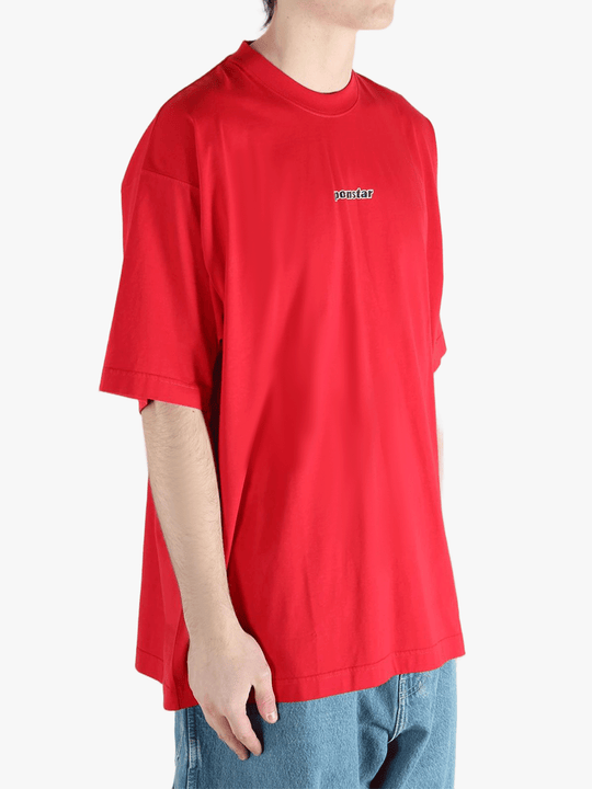 Red t-shirt worn by a person, showing the t-shirt fit