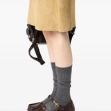 Brown shoes worn by a person, showing the shoes fit