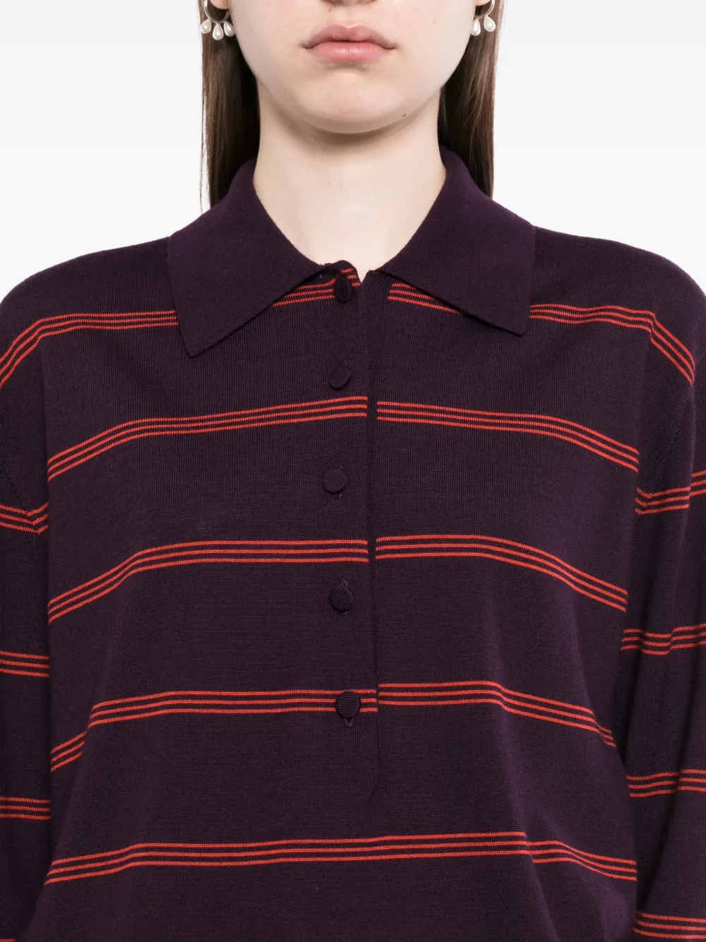 Close up of purple sweater, showing texture of the Merino Wool fabric