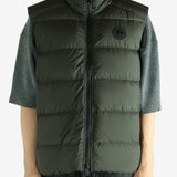 Green vest worn by a person, showing the vest's fit