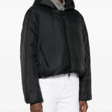 Black jacket worn by a person, showing the jacket's fit