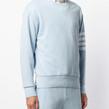 Light blue sweater worn by a person, showing the sweater fit