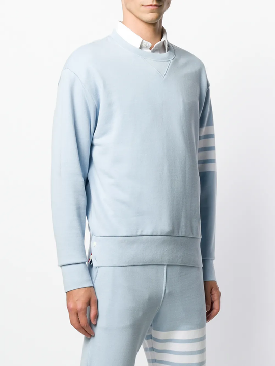 Light blue sweater worn by a person, showing the sweater fit