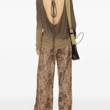 Green top, full body view