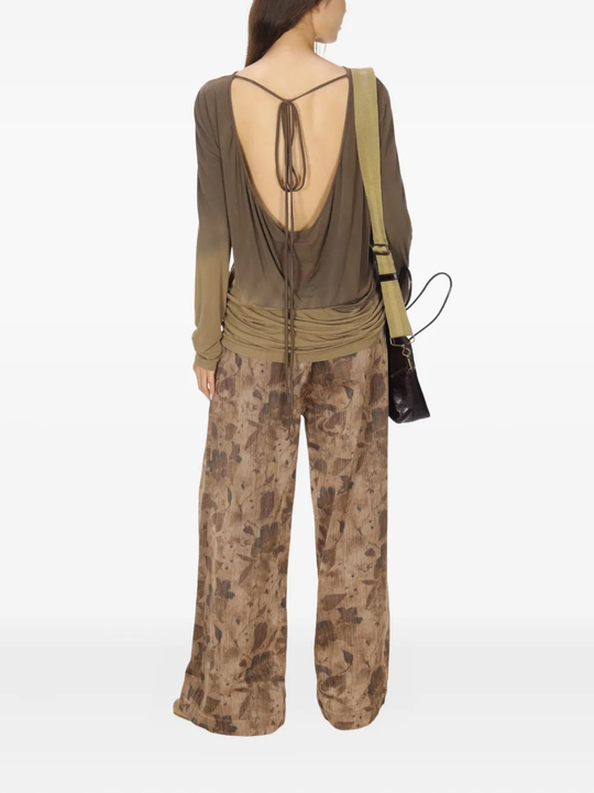 Green top, full body view