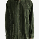 Green jacket worn by a person, showing the jacket's fit