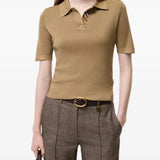 Tan shirt worn by a person, showing the shirt fit