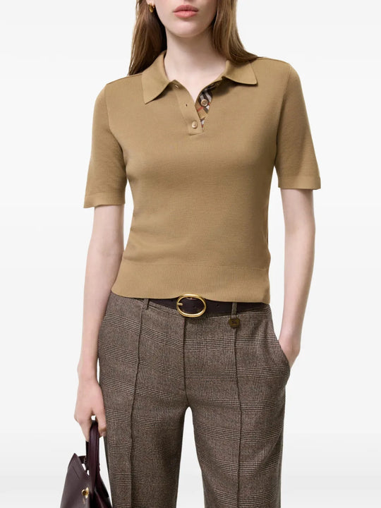 Tan shirt worn by a person, showing the shirt fit