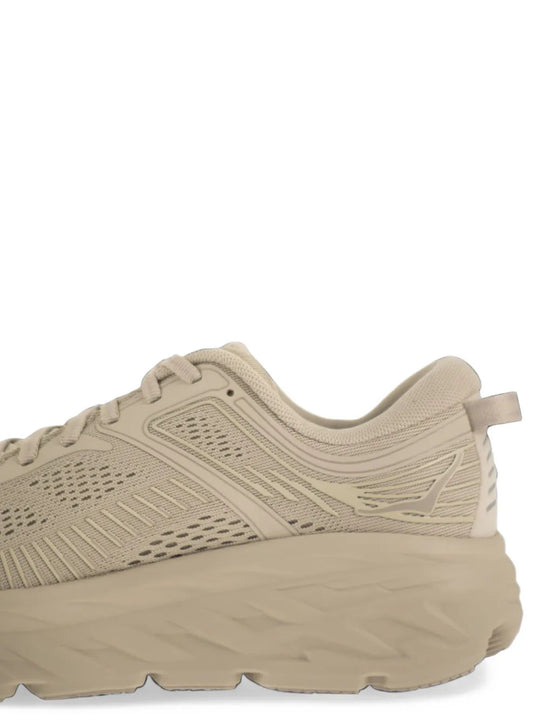 Tan shoes, side view