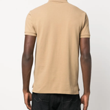 yellow t-shirts worn by a person, showing the t-shirts  fit