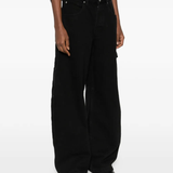 black jeans,worn by a person, showing the  jeans fit