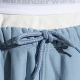 Close up of the blue pants, showing texture of the cotton fabric