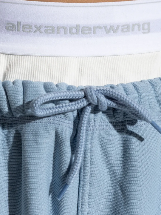 Close up of the blue pants, showing texture of the cotton fabric