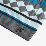 Close up of blue hat, showing texture of the wool blend fabric