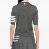 Grey t-shirts worn by a person, showing the t-shirts fit