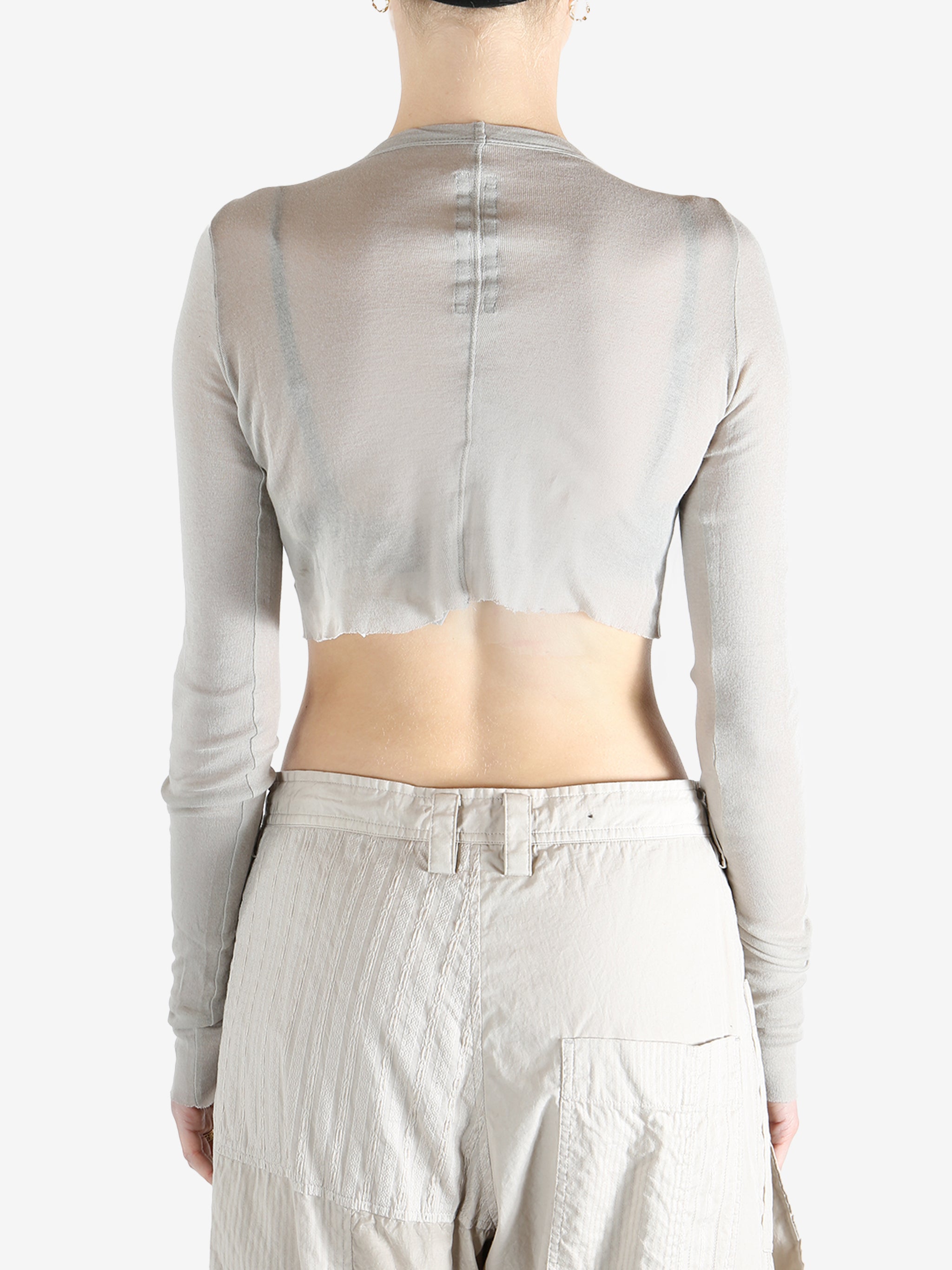 Grey t-shirt worn by a person, showing the t-shirt's fit