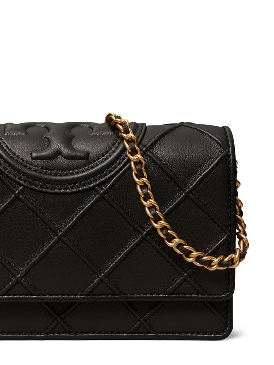 Close up of black bag, showing texture of the leather fabric