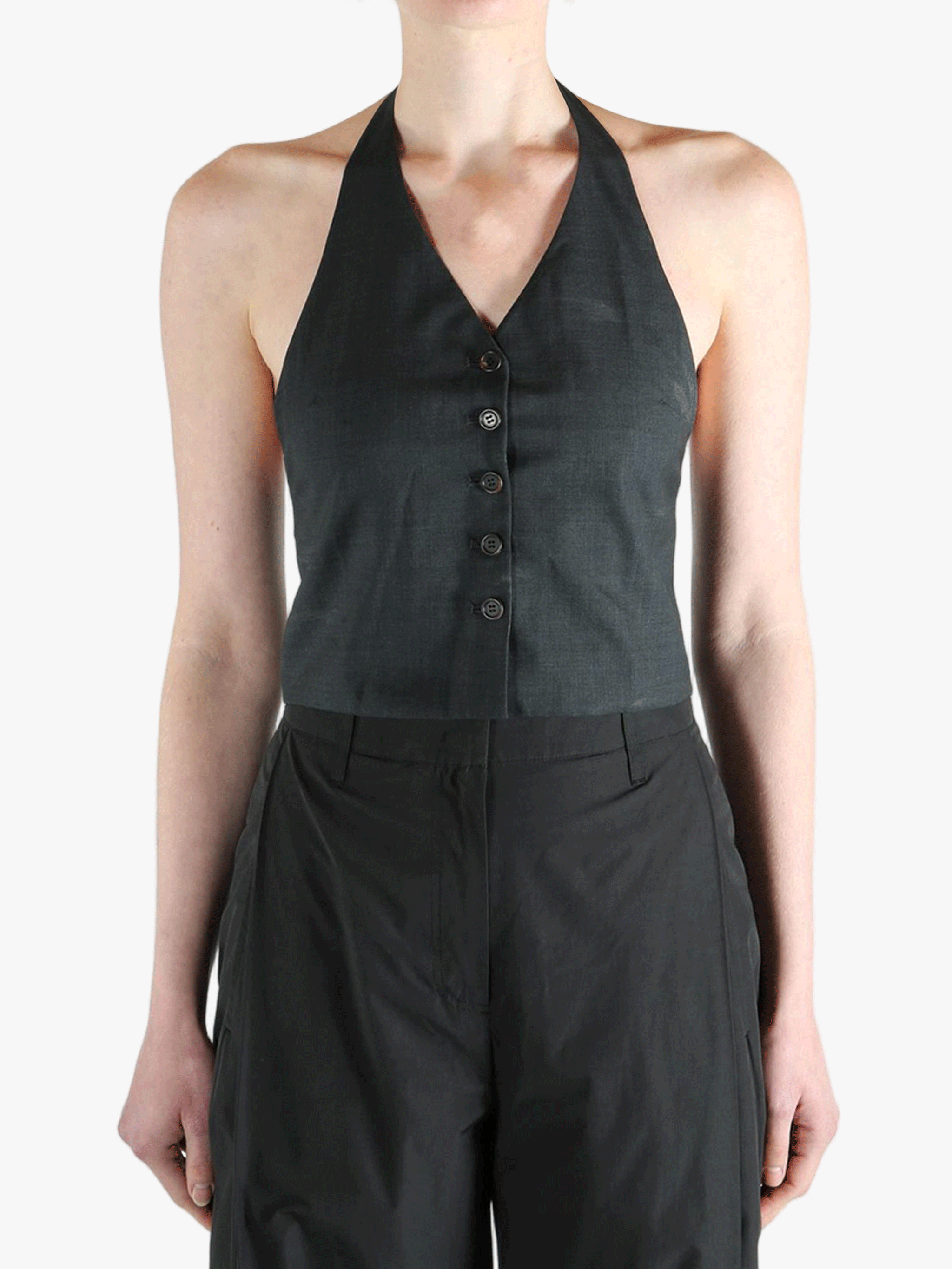 Black top worn by a person, showing the top's fit