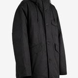 Black jacket worn by a person, showing the jacket fit