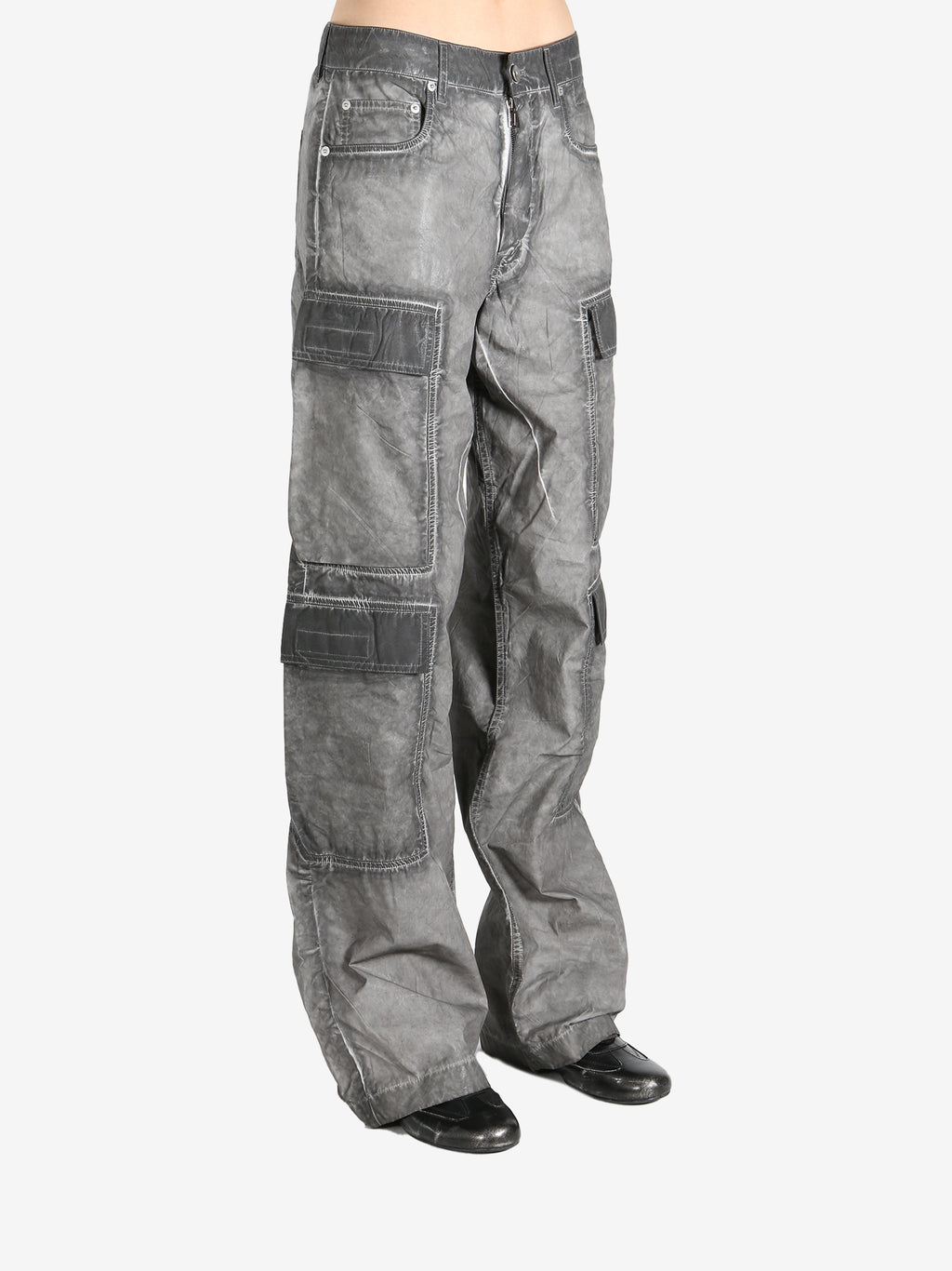 Grey jeans worn by a person, showing the jeans fit