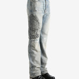 Blue jeans worn by a person, showing the jeans fit