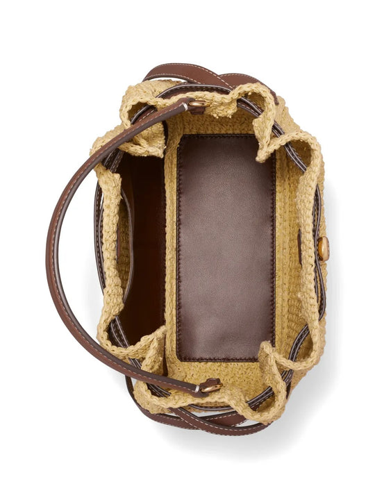 Close up of tan bags, showing texture of the paper raffia fabric