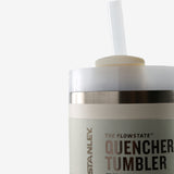 Close up of tan tumbler, showing texture of the stainless steel fabric